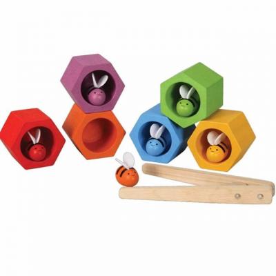 PLAN TOYS Jeu en bois Nids d'Abeilles