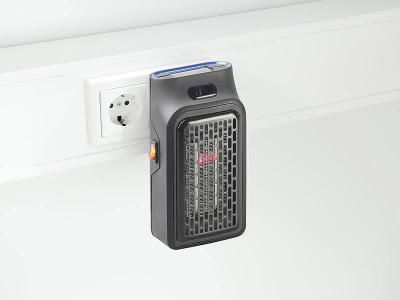 Mini chauffage soufflant t&eacute;l&eacute;command&eacute; 500 w sur prise secteur lv-155. Rc